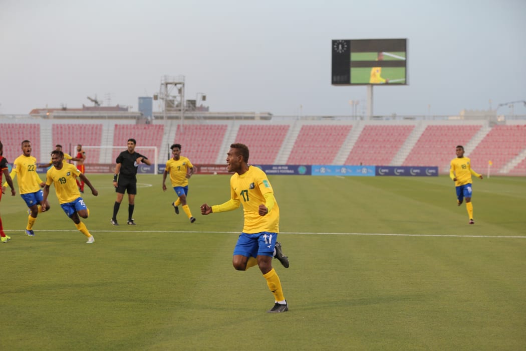 Alwin Hou celebrates a goal.