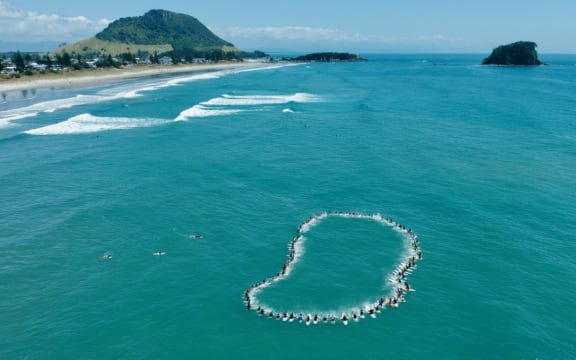 A paddle out was organised by Surfing NZ and Bay Boardriders tpay tribute to the six lives lost in the Mount Maunganui landslide.