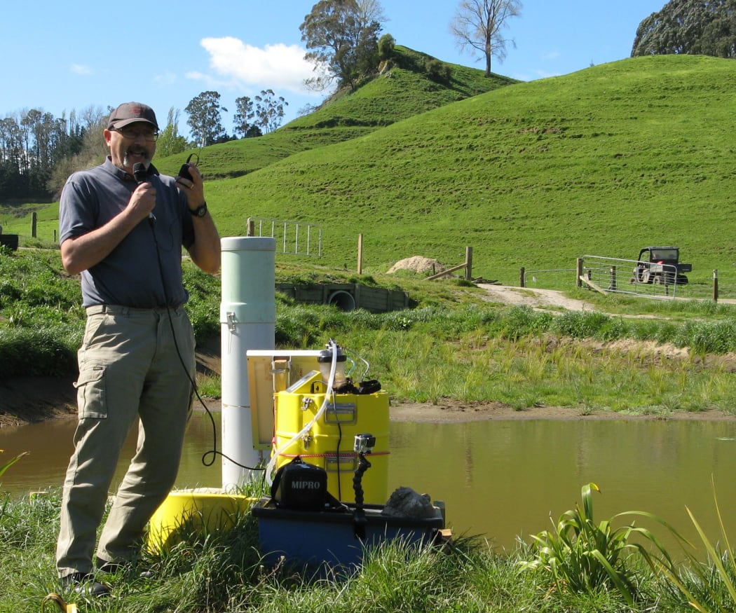 James Sukias NIWA beside water sampling equipment