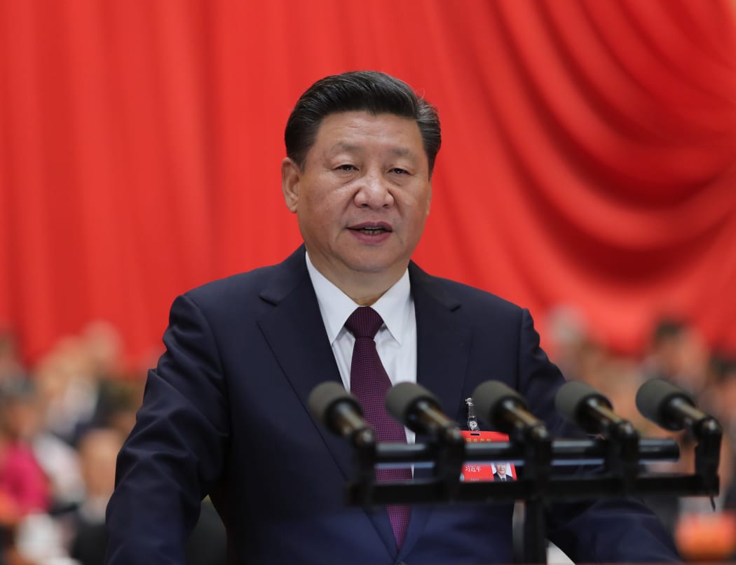 Xi Jinping delivers a report to the 19th National Congress of the Communist Party of China on behalf of the 18th Central Committee at the Great Hall of the People in Beijing.