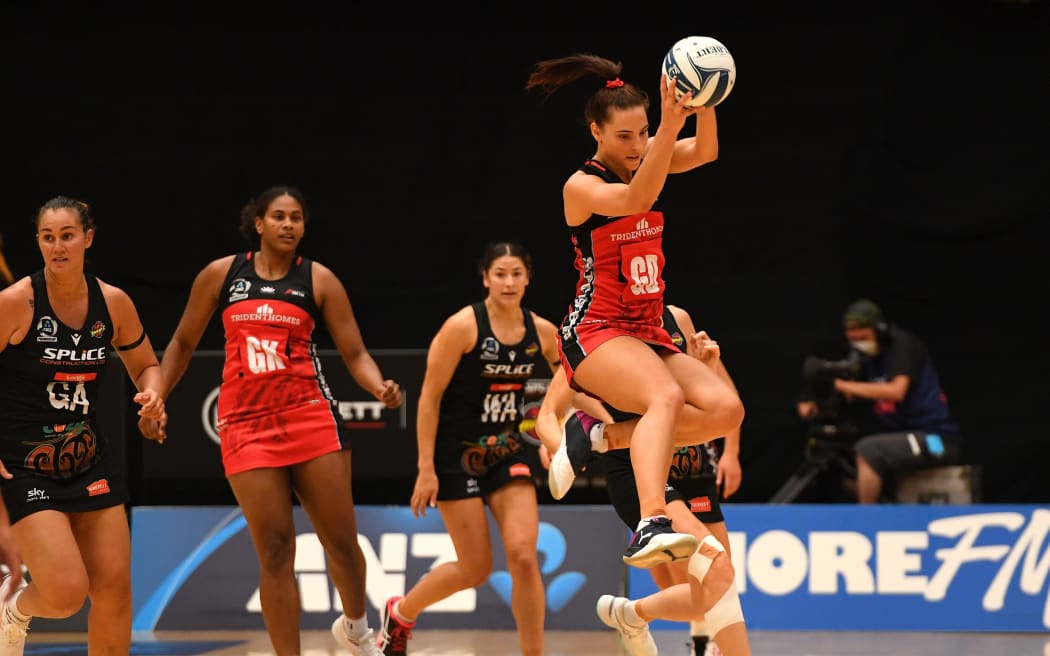 Karin Burger playing for the Tactix against the Magic.