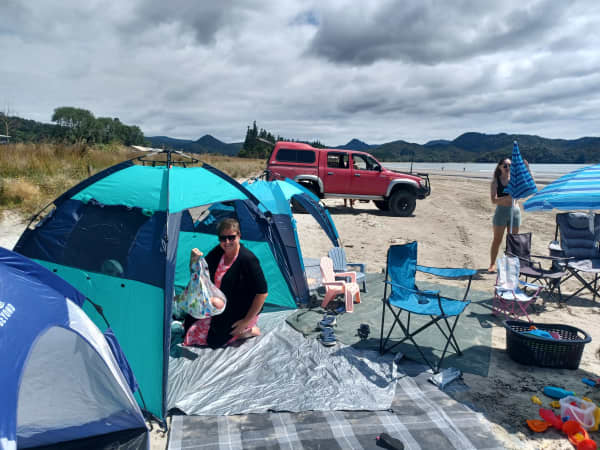 A tent on the beach serves as a good spot for a post natal check-up