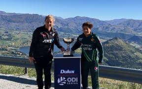 White Ferns skipper Sophie Devine with Pakistan captain Nida Dar atop the Remarkables in Queenstown.