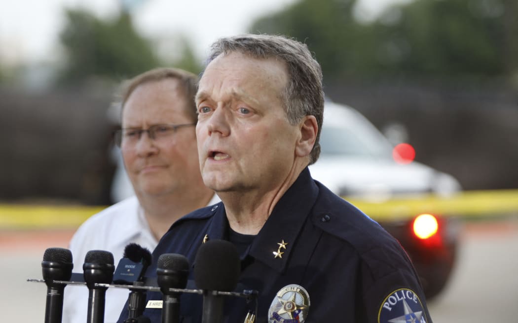 ALLEN, TEXAS - MAY 6: Allen Police Chief Brian Harvey delivers a statement to the press at the scene of a shooting at Allen Premium Outlets on May 6, 2023 in Allen, Texas. According to reports, a shooter opened fire at the outlet mall, injuring nine people who were taken to local hospitals. The police have confirmed there were fatalities but have not specified how many. The unidentified shooter was neutralized by an Allen Police officer responding to an unrelated call.   Stewart F. House/Getty Images/AFP (Photo by Stewart F. House / GETTY IMAGES NORTH AMERICA / Getty Images via AFP)