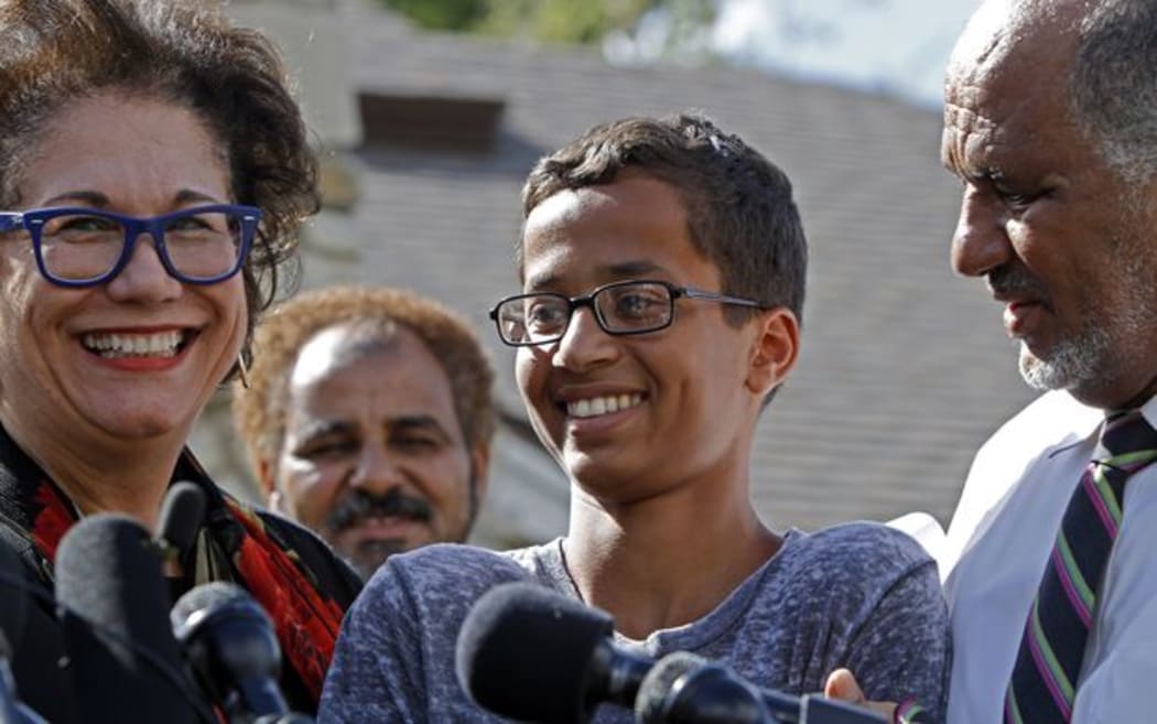 Left to right: Attorney Linda Moreno, Ahmed Mohamed, and his father Mohamed Elhassan Mohamed address the media during a news conference.
