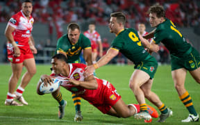 Tevita Pangai scores a try during the rugby league match between the Australian Kangaroos and Tonga Invitational XIII.