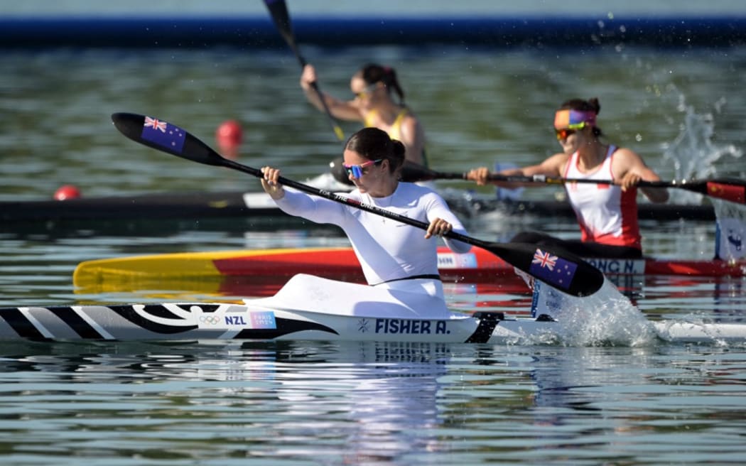 New Zealand's Aimee Fisher competes in the women's kayak single 500m semifinal of the canoe sprint competition at Vaires-sur-Marne Nautical Stadium in Vaires-sur-Marne during the Paris 2024 Olympic Games on August 10, 2024. (Photo by Bertrand GUAY / AFP)