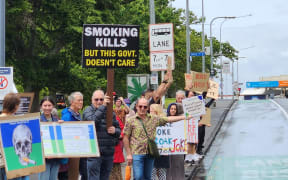People gathered at the rally in Auckland against the government's plans to repeal Smokefree legislation, on 13 December, 2023.
