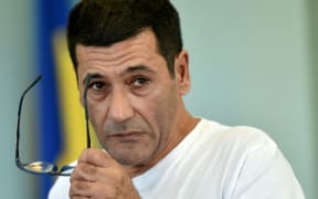 Gilbert Chikli on trial in Kyiv on September 26, 2017.