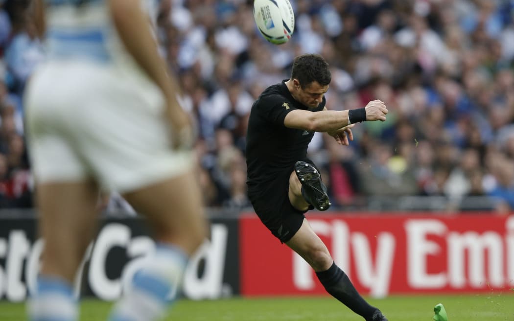 Dan Carter converts one of the All Blacks' tries during their first match of the Rugby World Cup against Argentina.