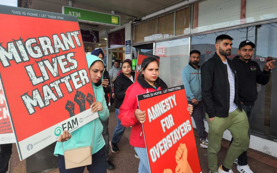 An anti-exploitation protest marches through the Papatoetoe town centre.