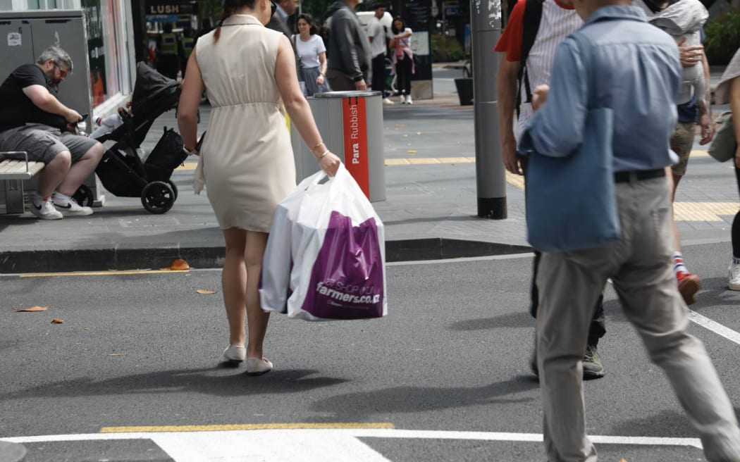 shopping and shoppers generic on Queen Street in downtown Auckland Black Friday 29 November 2024 .
