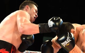 New Zealand heavyweight Joseph Parker knocks out Australian Bowie Tupou in the first round of their fight.