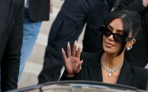 US celebrity Kim Kardashian leaves the courthouse after testifying before the Assize Court for the trial over the 2016 robbery that saw her relieved of millions of dollars' worth of jewellery at gunpoint in Paris, on May 13, 2025. The trial of this sensational nine million euro jewellery robbery opened in Paris on April 28, 2025. (Photo by Alain JOCARD / AFP)