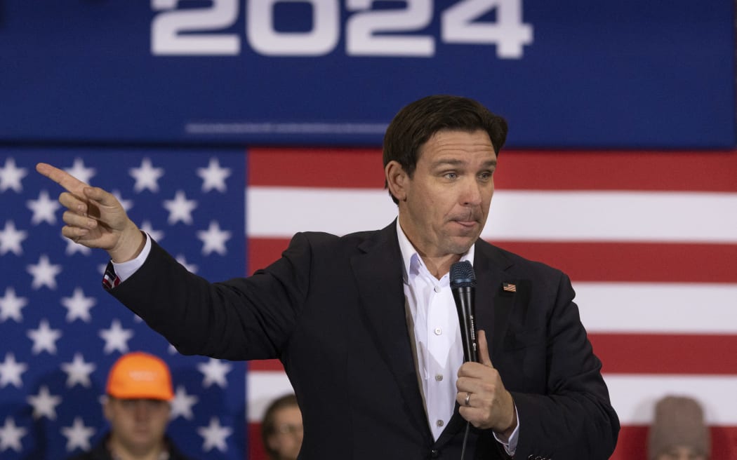Florida Governor and 2024 Republican presidential hopeful Ron DeSantis speaks at a campaign event in Davenport, Iowa, on January 13, 2024.