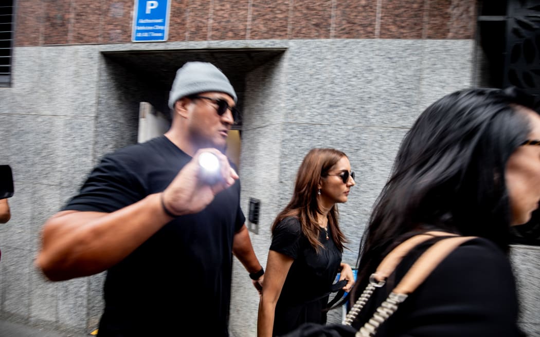 Golriz exiting court.