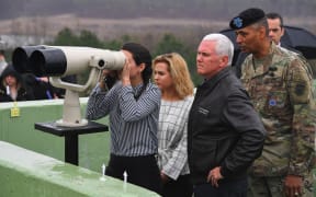 Mike Pence (second right) visits Observation Post Ouellette with his daughters near the truce village of Panmunjom in the Demilitarized Zone.