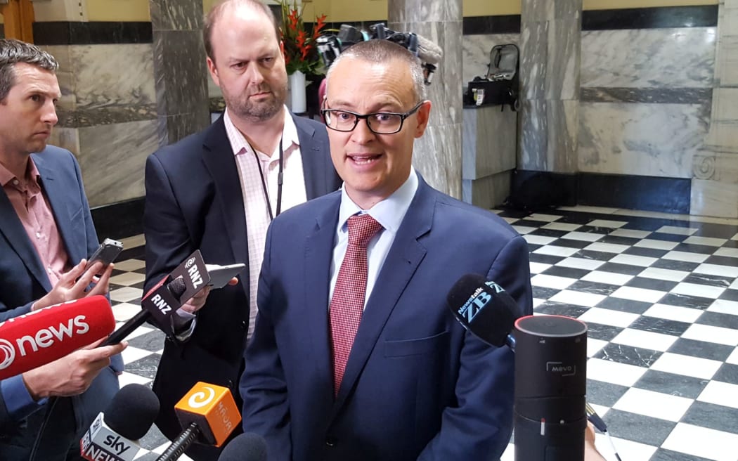 David Clark talks to media at Parliament.