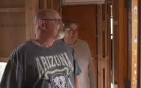 Dave and Keri Skelling, in their Ranui house, which flooded on Auckland Anniversary weekend.