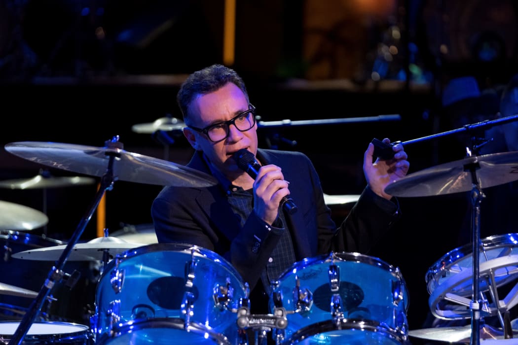 Fred Armisen behind a drum kit