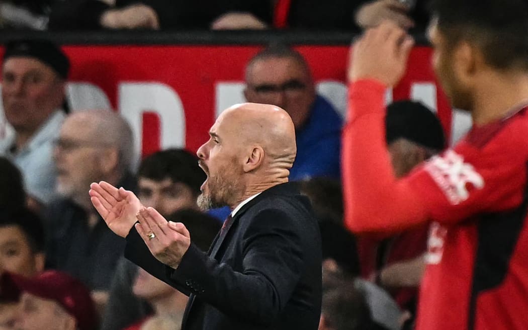 Manchester United's Dutch manager Erik ten Hag reacts during the English Premier League football match between Manchester United and Newcastle United at Old Trafford in Manchester, north west England, on May 15, 2024. (Photo by Oli SCARFF / AFP) / RESTRICTED TO EDITORIAL USE. No use with unauthorized audio, video, data, fixture lists, club/league logos or 'live' services. Online in-match use limited to 120 images. An additional 40 images may be used in extra time. No video emulation. Social media in-match use limited to 120 images. An additional 40 images may be used in extra time. No use in betting publications, games or single club/league/player publications. /
