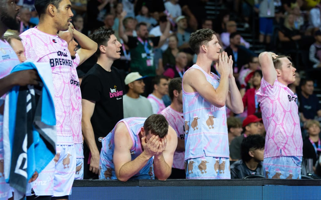 Breakers players react during the closing stages of their NBL game against the Sydney Kings.