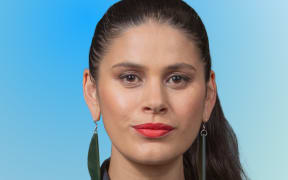 Host Māni Dunlop on a soft blue background