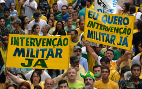 Tens of thousands of demonstrators rally to protest against the government of president Dilma Rousseff in Paulista Avenue in Sao Paulo Brazil on 15 March 2015.