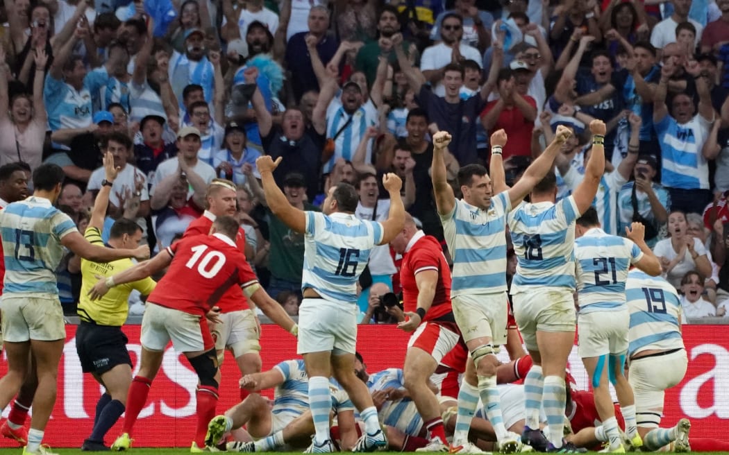 Argentina players celebrate their 2023 Rugby World Cup quarter-final win over Wales.