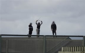 Youths on roof Korowai Manaaki, 31 December 2024