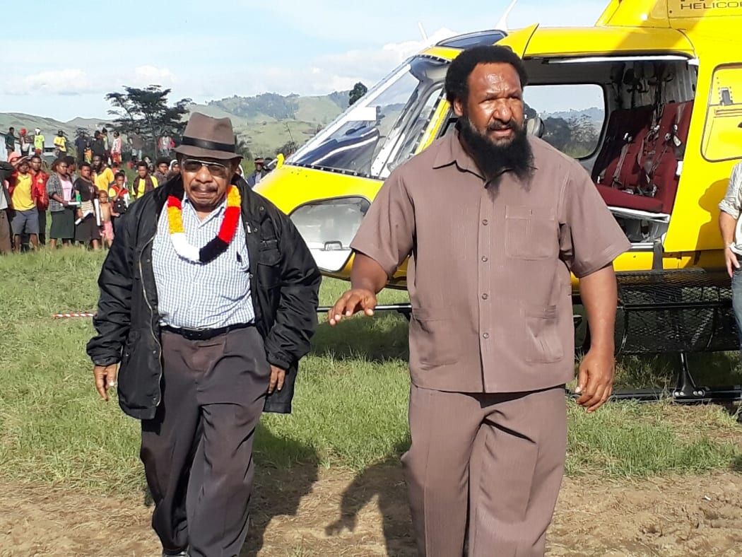 Don Polye (right) on the PNG election trail