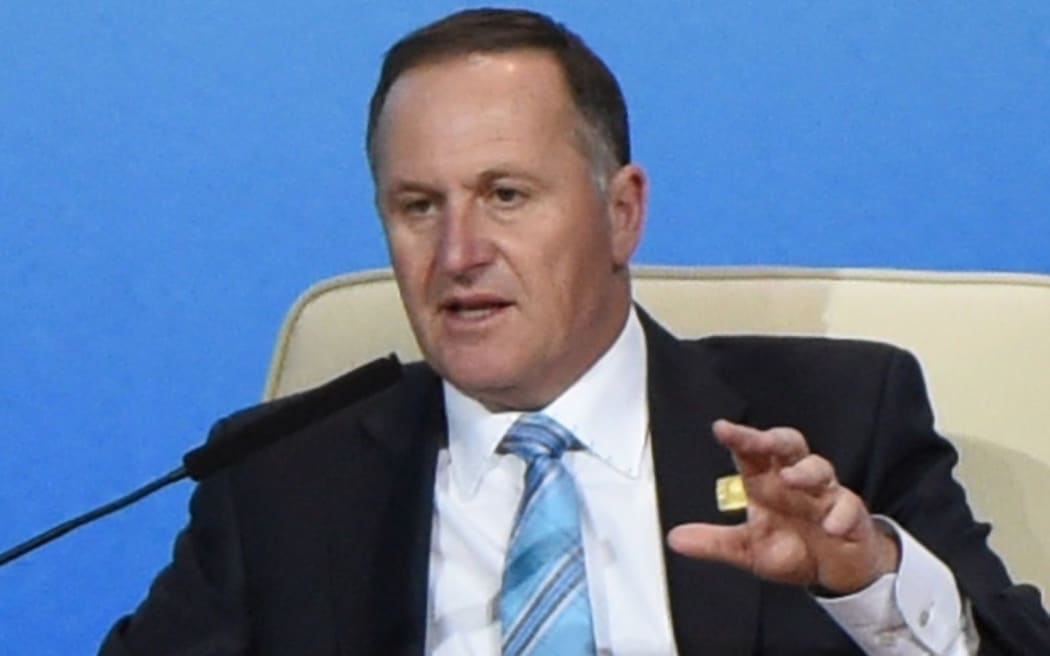 John Key speaking during the APEC CEO Summit in Beijing.