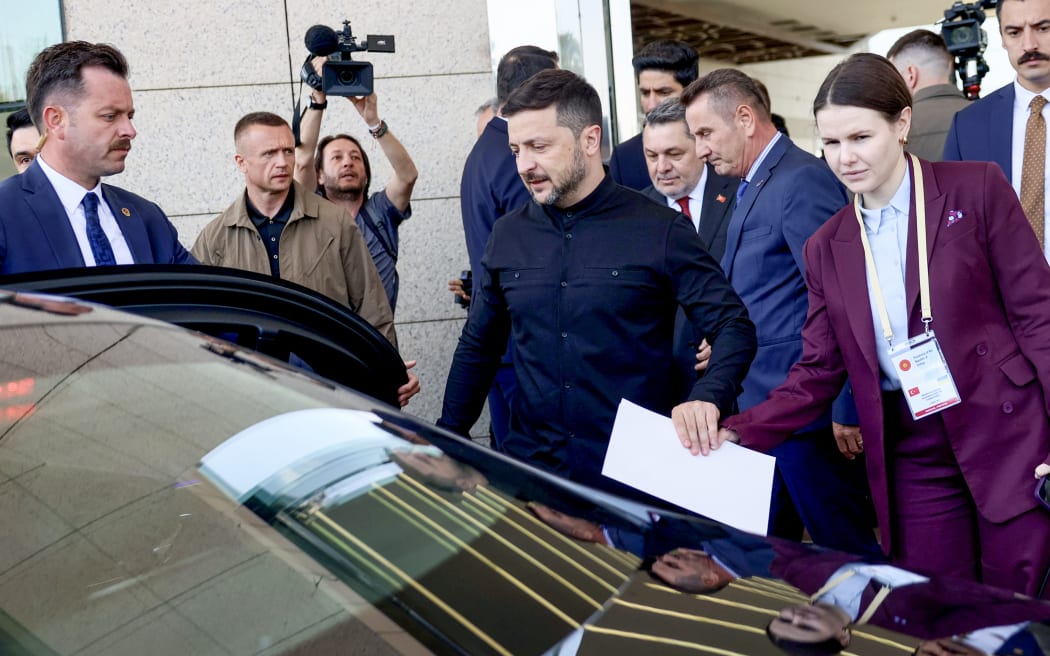 Ukrainian President Volodymyr Zelensky (C) arrives at Ankara airport in Turkey on 15 May, 2025.