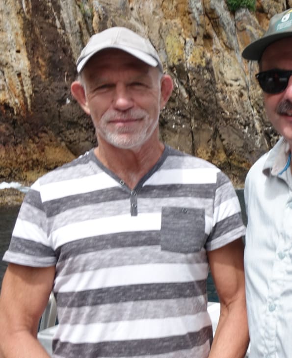 DOC chief science advisor Ken Hughey and DOC director general Lou Sanson at Poor Knights Islands.