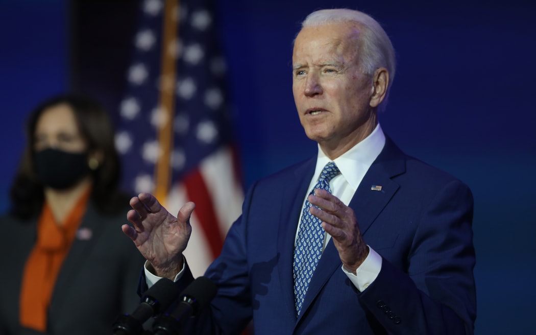 President-elect Joe Biden speaks to the media while flanked by Vice President-elect Kamala Harris, after receiving a briefing from the transition COVID-19 advisory board on November 09, 2020.
