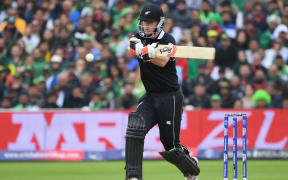 New Zealand's James Neesham plays a shot during the 2019 Cricket World Cup group stage match between the Black Caps and Pakistan at Edgbaston.