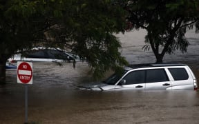 Flood waters enter in the parking lot outside the Robina Hospital on the Gold Coast as severe rain continue throughout south-east Queensland following Cyclone Debbie, on 20 March, 2017.