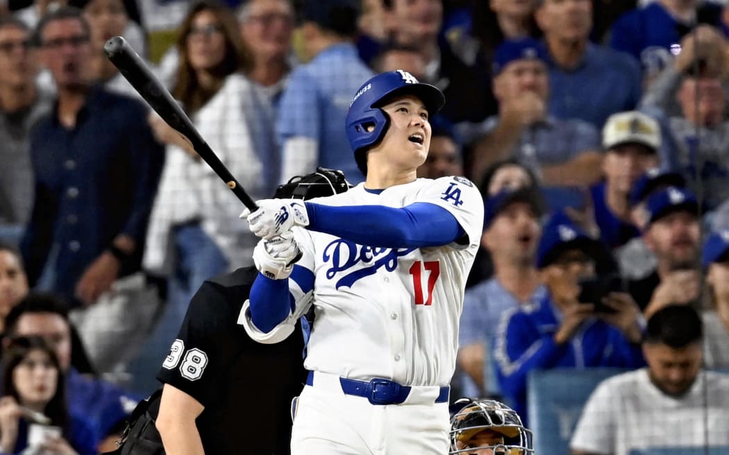 [FILE PHOTO]Los Angeles Dodgers Shohei Otani hits a home run in the seventh inning of Game 4 during the National League Championship Series against the Milwaukee Brewers at Dodger Stadium in Los Angeles, California, on October 17, 2025. (The Yomiuri Shimbun) (Photo by Keita IIJIMA / The Yomiuri Shimbun via AFP)