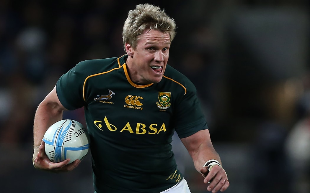 Jean de Villiers of the Springboks running with the ball.