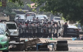 Protesters continue to protest against military coup and detention of elected government members in Yangon, Myanmar on March 13, 2021.