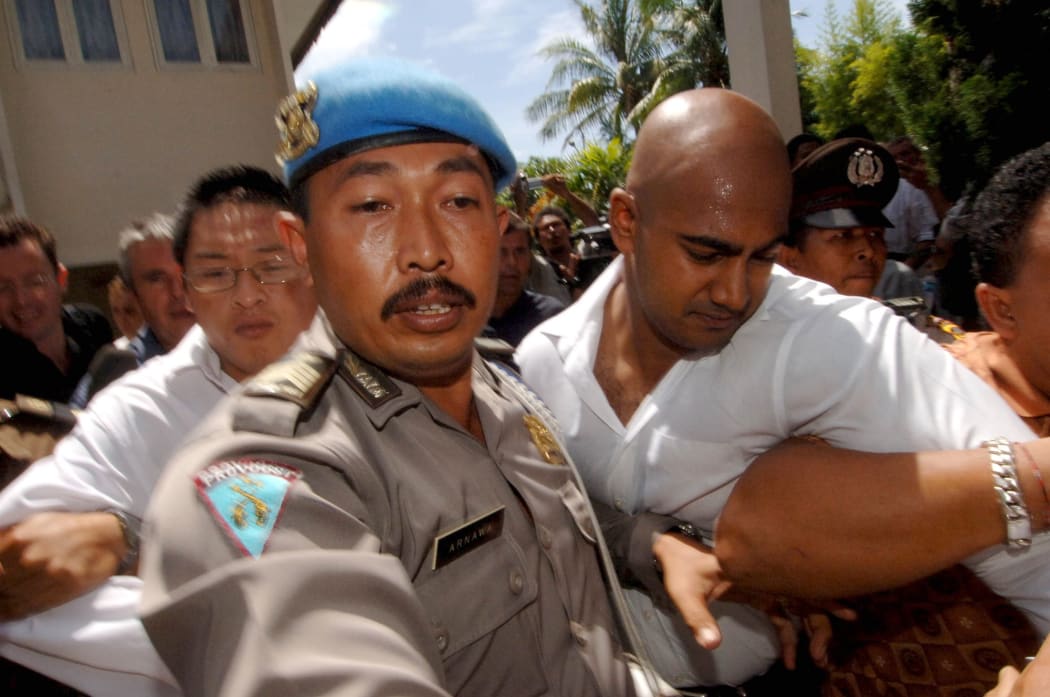A 2006 file photo shows Myuran Sukumaran (right) and Andrew Chan arriving at Denpasar Court to be sentenced.