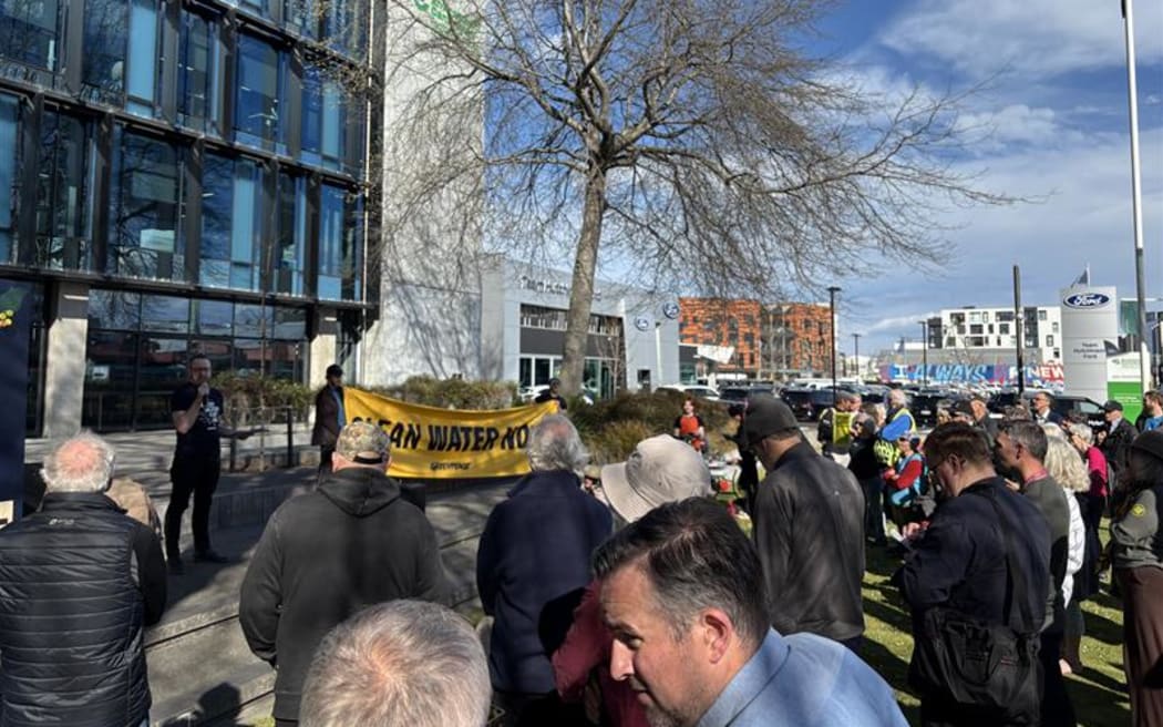 Protesters outside the Canterbury Regional Council offices demand action on nitrate levels.