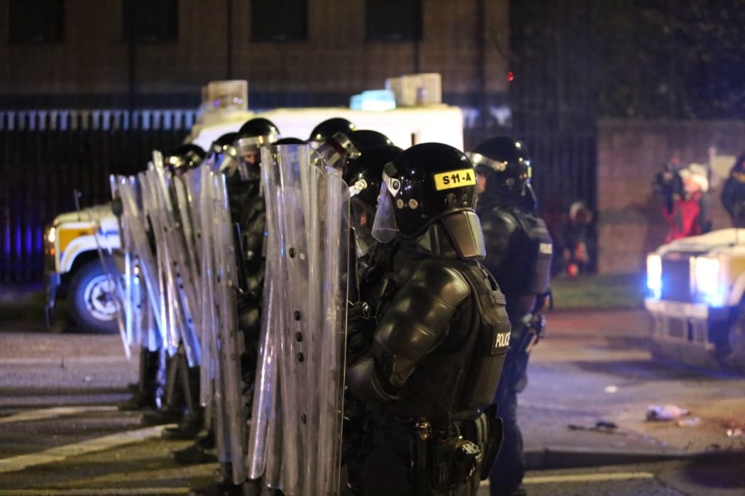 BELFAST, NORTHERN IRELAND - APRIL 09: Police take security measures and deployed water cannons as rioters hurled petrol bombs, fireworks and stones at police amid unrest since Wednesday, in Belfast, Northern Ireland on April 09, 2021. â¨