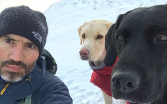 Andrew Cotter with Olive (r) and Mabel (l)