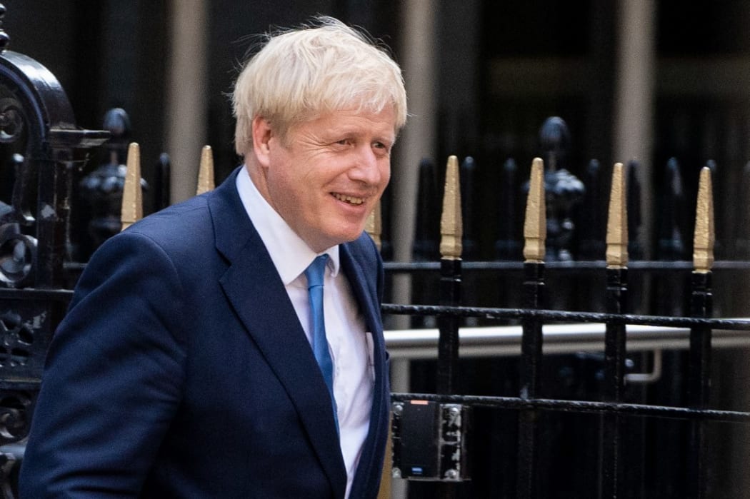 New Conservative Party leader and incoming prime minister Boris Johnson leaves the Conservative party headquarters in central London.