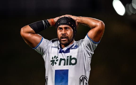 Patrick Tuipulotu (captain) of the Blues.