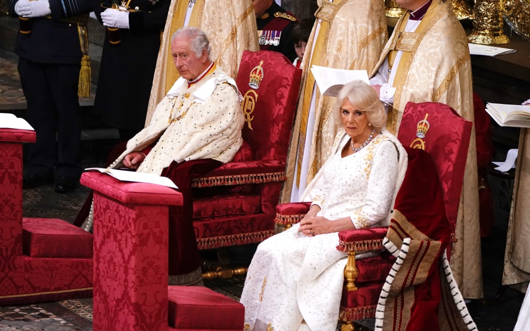 Britain's King Charles III and Britain's Camilla, Queen Consort attend their coronations at Westminster Abbey, in central London on May 6, 2023. - The set-piece coronation is the first in Britain in 70 years, and only the second in history to be televised. Charles will be the 40th reigning monarch to be crowned at the central London church since King William I in 1066. Outside the UK, he is also king of 14 other Commonwealth countries, including Australia, Canada and New Zealand. Camilla, his second wife, will be crowned queen alongside him and be known as Queen Camilla after the ceremony. (Photo by Yui Mok / POOL / AFP)