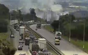 A truck caught fire just before the Ramarama off-ramp.