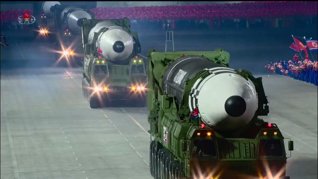 A screen grab taken from a KCNA broadcast on October 10, 2020 shows what appears to be new North Korean intercontinental ballistic missiles during a military parade on Kim Il Sung square in Pyongyang.