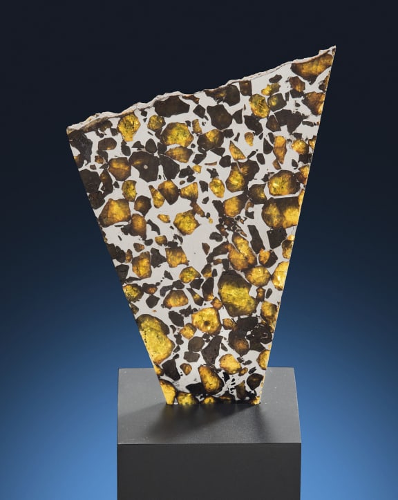A partial slice of Imilac meteorite with Peridot. Estimate £2000 to £3000. Christie's is holding an auction of more than 80 meteorites.